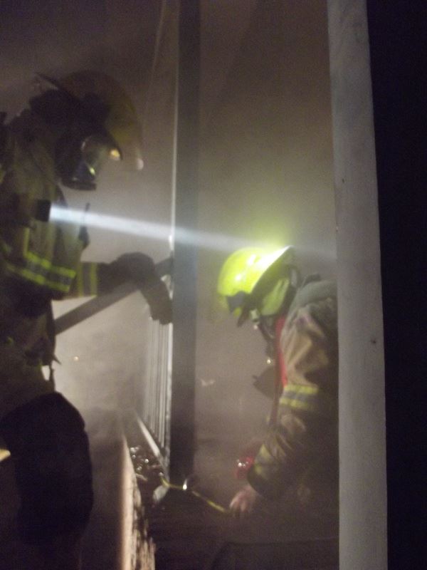 Fire Suppression Team Working in Night